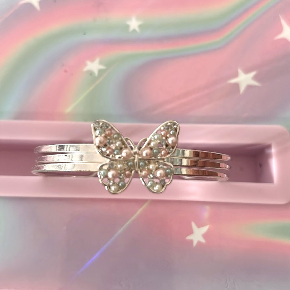 Beautiful cuff with butterfly pendant and pearl accents